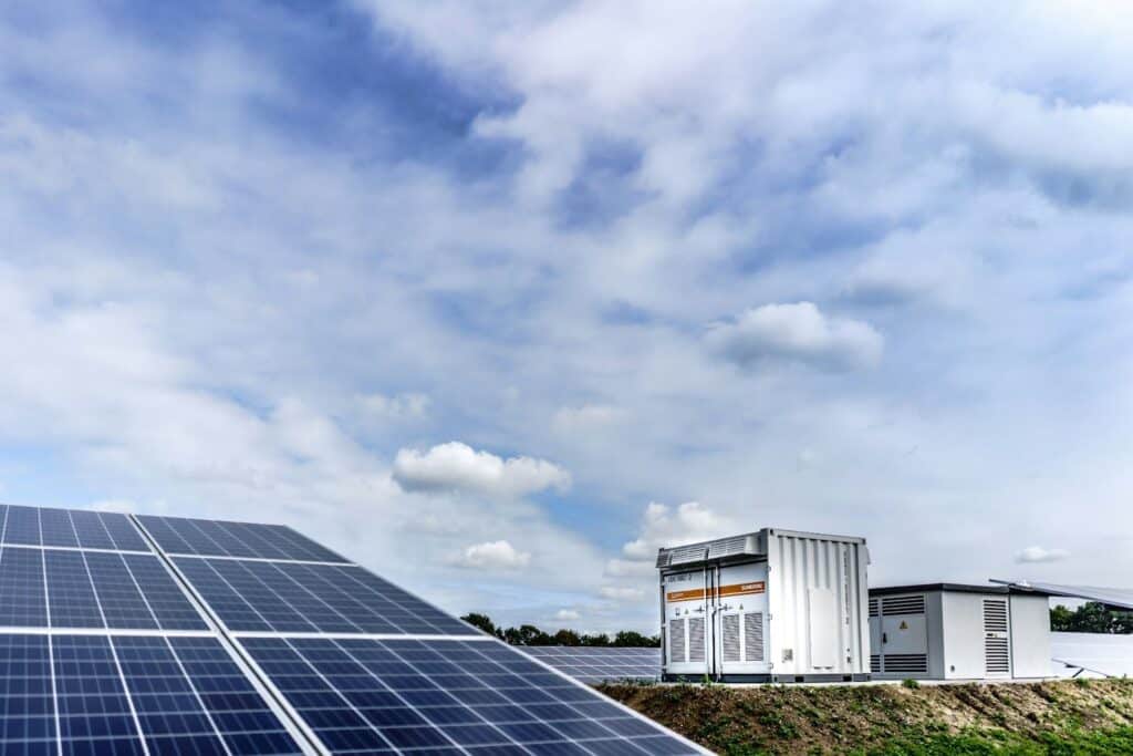 Renewable energy sources including solar and wind power integrated with AI data center operations